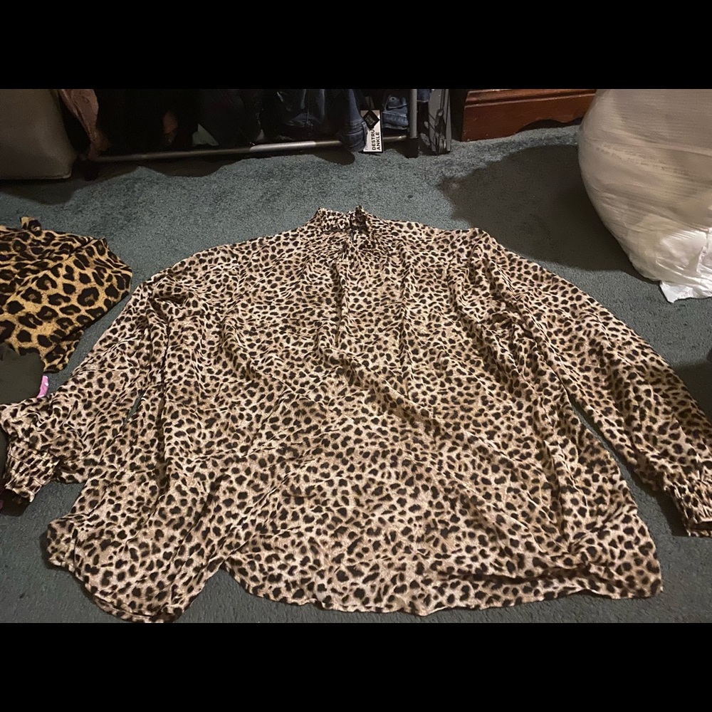 Long sleeve leopard top. Sheer fabric, turtle neck, flowy, stretch. And ruffles